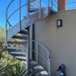 Compact metal staircase with a small footprint