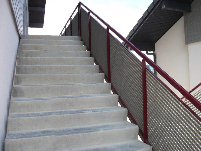 Stair railing with press-locked grating infill